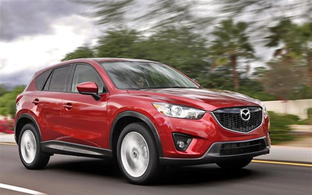 <b>2013 TOP PICK</b>: <b><a href="http://ca.autos.yahoo.com/newcars/mazda/cx-5/2013/model_overview/" data-ylk="slk:Mazda CX-5 Touring;elm:context_link;itc:0;sec:content-canvas" class="link ">Mazda CX-5 Touring</a></b> <br> <b>BEST FOR</b>: Young professionals hauling bikes or surfboards<br> <b>STARTING PRICE</b>: $24,690<br> <b>AVG. FUEL ECONOMY</b>: 8.4L/100KM<br> <b>BUZZ</b>: Critics knock this sporty new fuel-sipping crossover for being somewhat underpowered, but we found its driving manners those of an excited puppy: fun, fearless and champing at the bit. We liked the roomy, understated interior and well-chosen tech options, including back-up camera, Bluetooth and blind-spot monitor.<br><b><br>WATCH FOR YEAR-END SALES ON</b><br><a href="http://ca.autos.yahoo.com/newcars/mazda/cx-7/2012/model_overview/" data-ylk="slk:2012 CX-7;elm:context_link;itc:0;sec:content-canvas" class="link ">2012 CX-7</a> | <a href="http://ca.autos.yahoo.com/newcars/mazda/mx-5/2012/model_overview/" data-ylk="slk:2012 MX-5;elm:context_link;itc:0;sec:content-canvas" class="link ">2012 MX-5</a> | <a href="http://ca.autos.yahoo.com/newcars/mazda/cx-9/2012/model_overview/" data-ylk="slk:2012 CX-9;elm:context_link;itc:0;sec:content-canvas" class="link ">2012 CX-9</a> | <a href="http://ca.autos.yahoo.com/newcars/mazda/mazda5/2012/model_overview/" data-ylk="slk:2012 Mazda5;elm:context_link;itc:0;sec:content-canvas" class="link ">2012 Mazda5</a> | <a href="http://ca.autos.yahoo.com/newcars/mazda/rx-8/2011/model_overview/" data-ylk="slk:2011 RX-8;elm:context_link;itc:0;sec:content-canvas" class="link ">2011 RX-8</a><br>