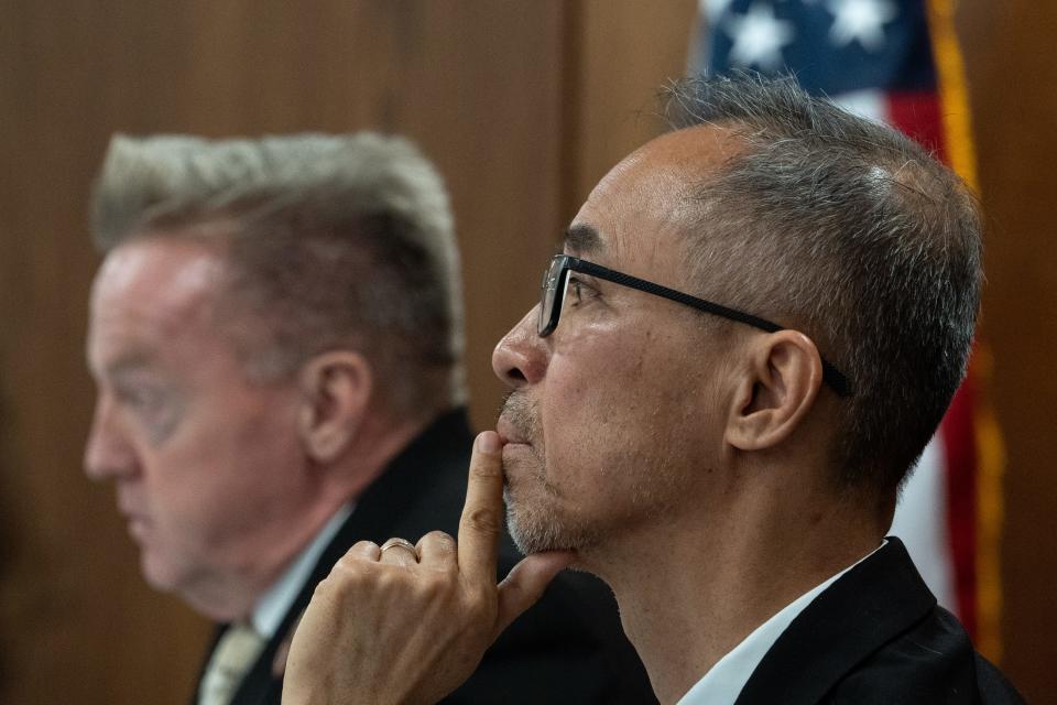 Rep. Quang Nguyen (right) listens during a Freedom of Expression Committee hearing on July 18, 2023, in a Senate Hearing room at the Arizona State Capital in Phoenix.