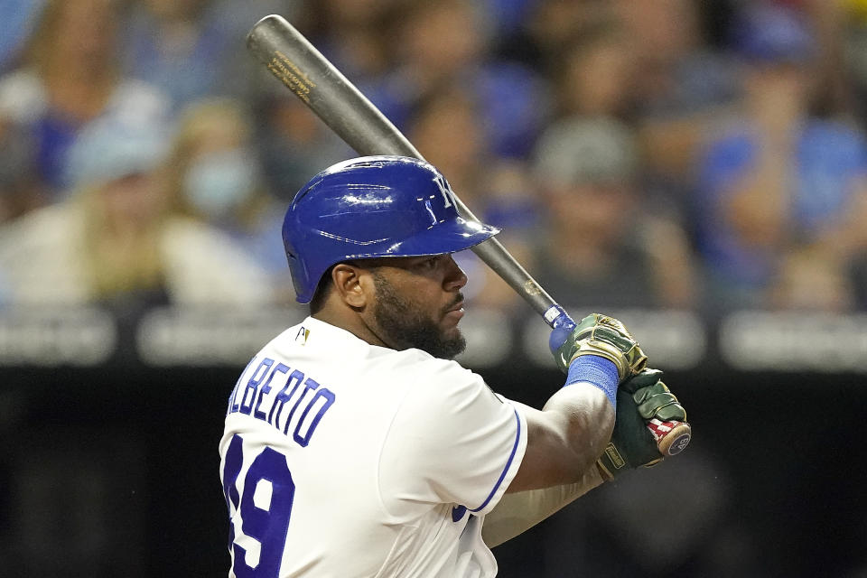 Kansas City Royals' Hanser Alberto hits a two-run single during the fourth inning of a baseball game against the Oakland Athletics Wednesday, Sept. 15, 2021, in Kansas City, Mo. (AP Photo/Charlie Riedel)