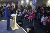 Newly elected Scottish National Party leader Humza Yousaf, left, speaks after being announced new SNP leader, at Murrayfield Stadium, in Edinburgh, Scotland, Monday, March 27, 2023. Scotland’s governing Scottish National Party elected Yousaf as its new leader on Monday after a bruising five-week contest that exposed deep fractures within the pro-independence movement. The 37-year-old son of South Asian immigrants is set to become the first person of color to serve as Scotland’s first minister. (Andrew Milligan/PA via AP)