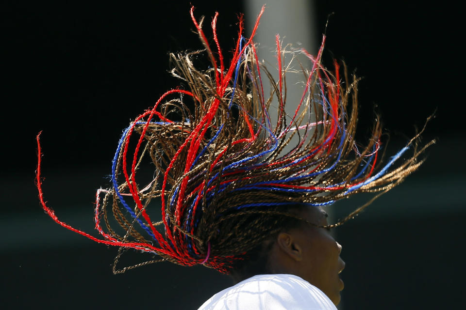 Venus Williams of the U.S. takes part in a training session at the All England Lawn Tennis Club before the start of the London 2012 Olympic Games in London July 26, 2012. REUTERS/Stefan Wermuth (BRITAIN - Tags: SPORT OLYMPICS TENNIS TPX IMAGES OF THE DAY)