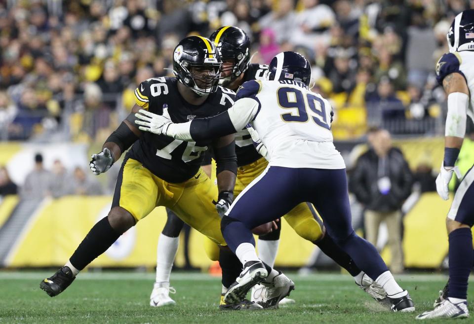 Nov 10, 2019; Pittsburgh, PA, USA; Pittsburgh Steelers offensive tackle Chukwuma Okorafor (76) blocks at the line of scrimmage against Los Angeles Rams defensive tackle Aaron Donald (99) during the third quarter at Heinz Field.