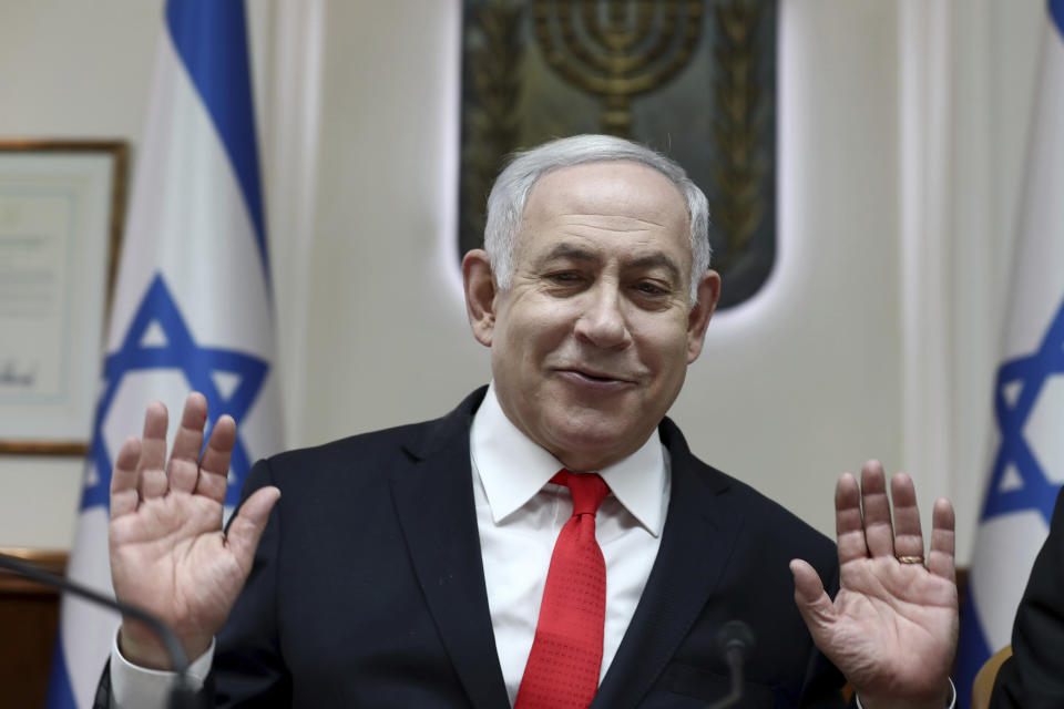 Israeli Prime Minister Benjamin Netanyahu reacts during the weekly cabinet meeting, at his office in Jerusalem, Sunday, Dec. 15, 2019. (Gali Tibbon/Pool via AP)