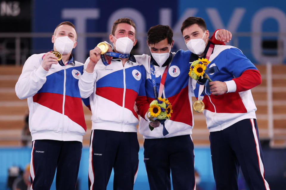 David Belyavskiy, Nikita Nagornyy, Artur Dalaloyan and Denis Abliazin of Team ROC pose with the gold medal after winning the Men's Team Final on day three of the Tokyo 2020 Olympic Games at Ariake Gymnastics Centre on July 26, 2021 in Tokyo, Japan.<span class="copyright">Jamie Squire—Getty Images</span>