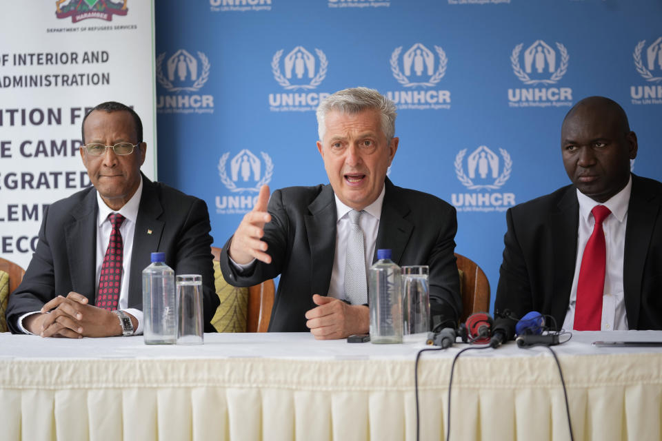 United Nations High Commissioner for Refugees Filippo Grandi, center, speaks during a press conference accompanied by Governor of Garissa County Nathif Jama Adam, left, and Principal Secretary for Immigration and Citizens Services Julius Bitok, right, in Nairobi, Kenya on the occasion of World Refugee Day Tuesday, June 20, 2023. Grandi visited the east African country and met with President William Ruto to show his appreciation for the country's planned integration programs allowing refugees to become self-sufficient. (AP Photo/Khalil Senosi)