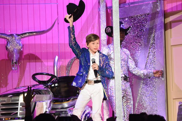 <p>Kevin Mazur/Getty </p> Mason Ramsey performs at the Grammys in 2020 alongside Lil Nas X