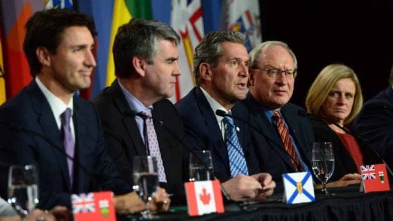 Pallister eyes scaling back refugee support as tiff with Ottawa festers