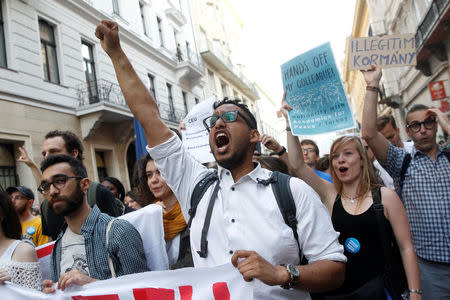 Students shout slogans during a demonstration against Prime Minister Viktor Orban's efforts to force a George Soros-founded university out of the country in Budapest, Hungary, April 2, 2017. REUTERS/Bernadett Szabo