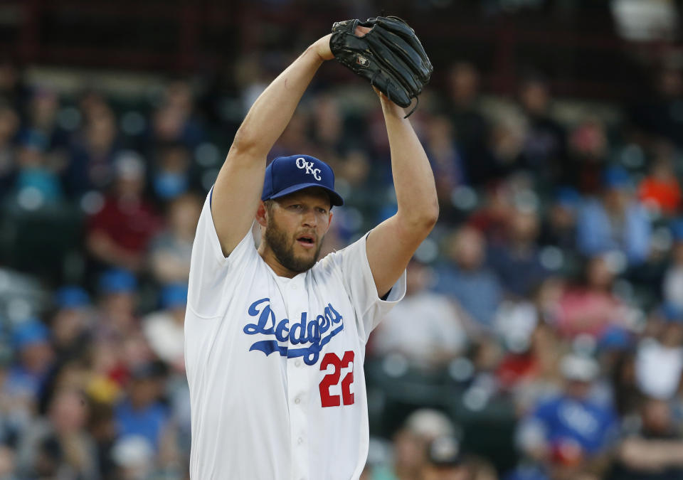 Clayton Kershaw winds up while pitcher for the Oklahoma City Dodgers on a rehab assignment, in the first inning of the team's Triple-A baseball game against the San Antonio Missions on Thursday, April 4, 2019, in Oklahoma City. (AP Photo/Sue Ogrocki)