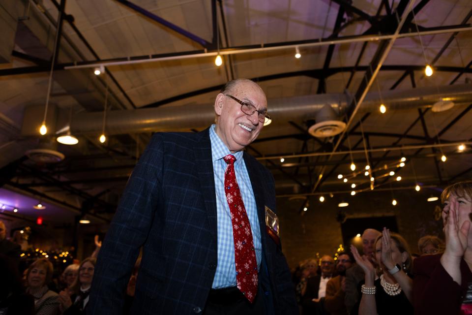 Armando Cardenas smiles after winning the 2023 Excalibur Award on Thursday, Dec. 14, 2023, at Prairie Street Brewing Co. in Rockford.