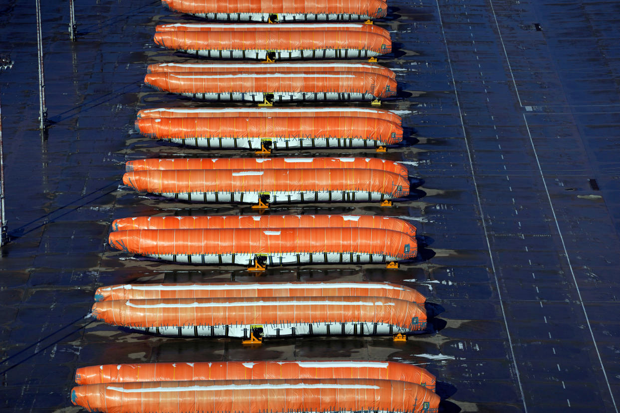 Airplane fuselages bound for Boeing's 737 Max production facility sit in storage at their top supplier, Spirit AeroSystems Holdings Inc, in Wichita, Kansas, U.S. December 17, 2019. REUTERS/Nick Oxford