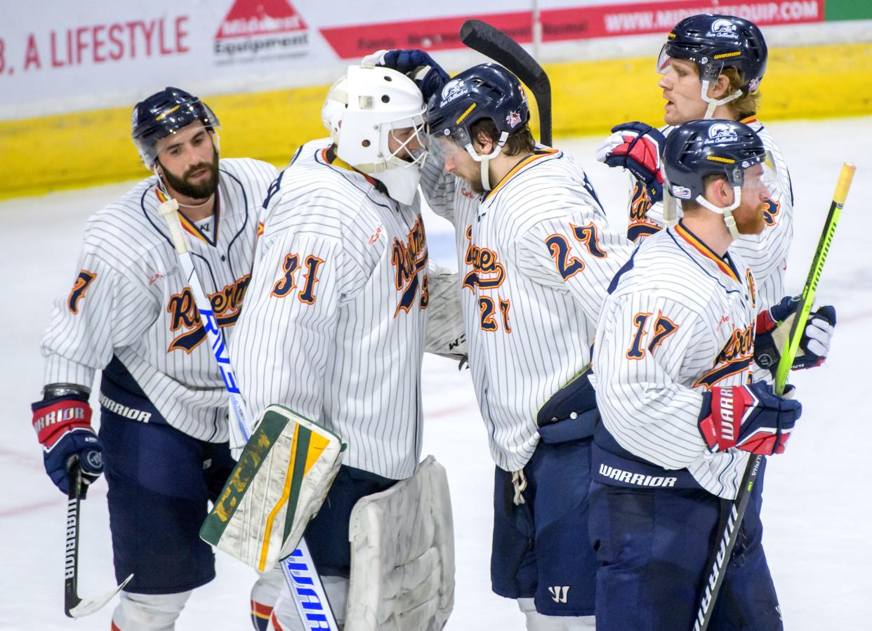 The Peoria Rivermen gather around goaltender Nick Latinovich after their 2-1 victory over the Quad City Storm in the regular-season finale Saturday, April 6, 2024 at the Peoria Civic Center.