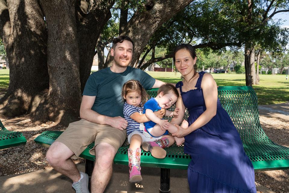 Milly Lee poses with her husband, Evan Eppinger, and children, Tori Eppinger, 3, and Arthur Eppinger, 9 months, Lee no longer has a heart murmur.