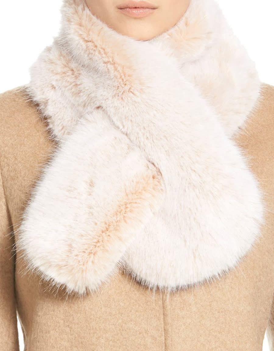 A faux fur stole gives adds a regal bearing to your party look. This one could easily pass for fine rabbit fur (without harming any bunnies).