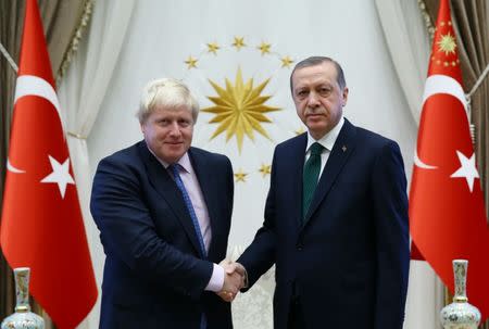 Turkish President Tayyip Erdogan (R) meets with British Foreign Secretary Boris Johnson at the Presidential Palace in Ankara, Turkey, September 27, 2016. Kayhan Ozer/Presidential Palace/Handout via REUTERS