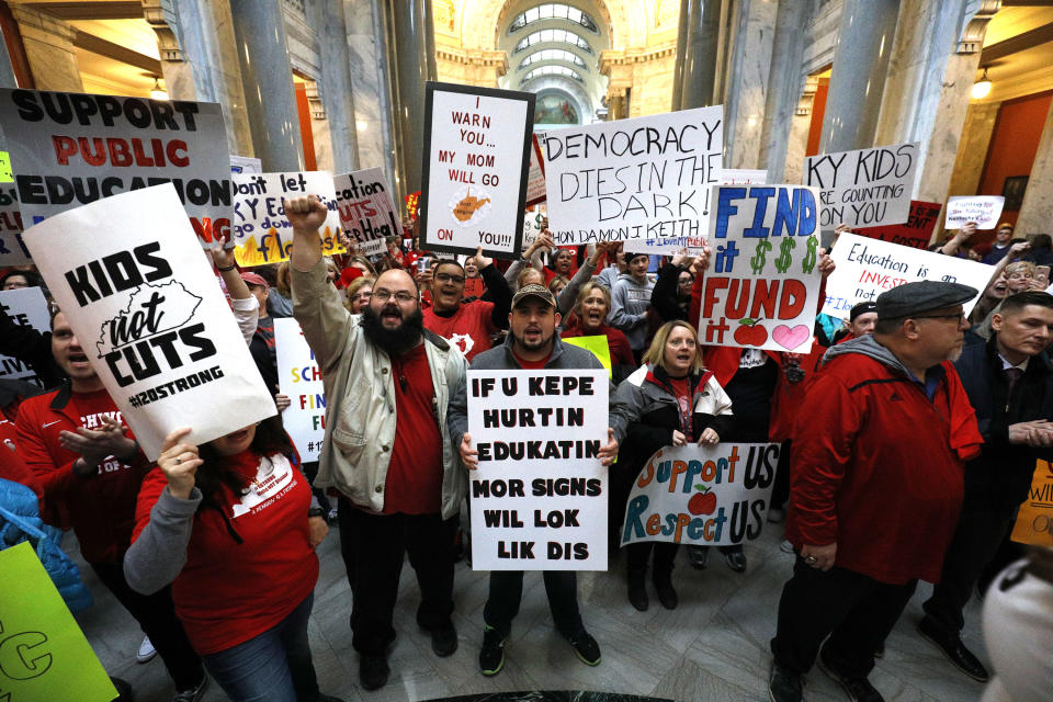 <p>Public school teachers and their supporters protest against a pension reform bill outside the senate chambers at the Kentucky State Capitol, April 2, 2018 in Frankfort, Ky. (Photo: Bill Pugliano/Getty Images) </p>