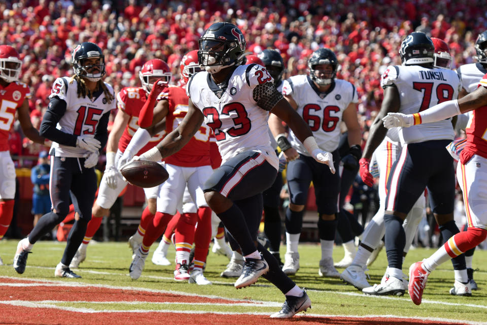 Houston Texans running back Carlos Hyde (23) scores a touchdown during the first half of an NFL football game against the Kansas City Chiefs in Kansas City, Mo., Sunday, Oct. 13, 2019. (AP Photo/Ed Zurga)