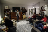 Abigail Bessler, center, daughter of Democratic presidential candidate Sen. Amy Klobuchar, D-Minn., speaks to supporters during a campaign gathering Tuesday, Jan. 21, 2020, in Stanton, Iowa. (AP Photo/Marcio Jose Sanchez)