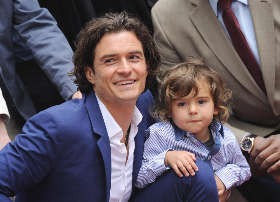 HOLLYWOOD, CA - APRIL 02:  Actor Orlando Bloom and his son Flynn Bloom attend the ceremony honoring Orlando Bloom with a Star on The Hollywood Walk of Fame on April 2, 2014 in Hollywood, California.  (Photo by Axelle/Bauer-Griffin/FilmMagic)