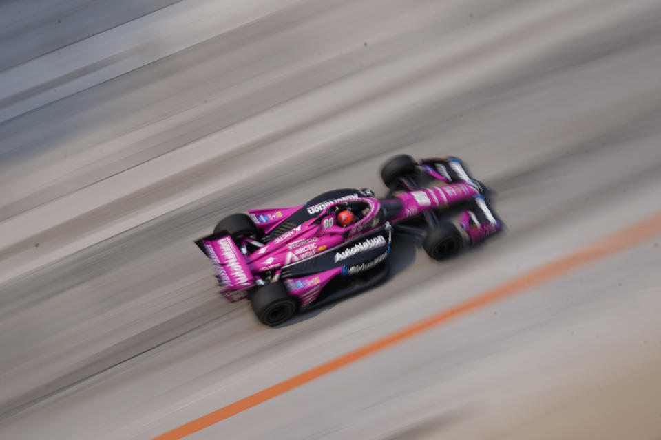 Simon Pagenaud, of France, drives during the IndyCar Detroit Grand Prix auto race, Sunday, June 4, 2023, in Detroit. (AP Photo/Carlos Osorio)