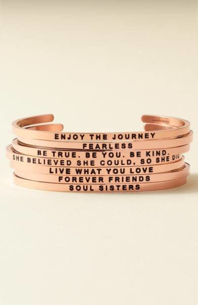 Get them an inspirational bracelet to look at whenever they're experiencing those weird post-grad feels. Get it at <a href="https://shop.nordstrom.com/s/mantraband-she-believed-she-could-cuff/4283912?origin=keywordsearch-personalizedsort&amp;fashioncolor=GOLD" target="_blank">Nordstrom</a>.