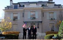 FILE PHOTO: U.S. President Bush stands with Israel's Prime Minister Olmert and Palestinian President Abbas in Annapolis