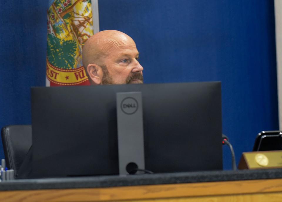 Circuit Judge Sherwood Bauer listens to the comments from family member of the victims during a court proceeding for accused killer Austin Harrouff at the Martin County Courthouse on Monday, Nov. 28, 2022 in Stuart, Florida. Harrouff was found not guilty by reason of insanity for killing John Stevens III, 59 and Michelle Mishcon, 53, during a brutal attack Aug. 15, 2016 at their home on Southeast Kokomo Lane in southern Martin County.