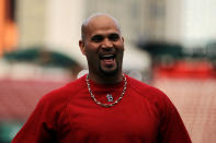 ST LOUIS, MO - OCTOBER 20: Albert Pujols #5 of the St. Louis Cardinals laughs on the field during batting practice prior to Game Two of the MLB World Series against the Texas Rangers at Busch Stadium on October 20, 2011 in St Louis, Missouri. (Photo by Ezra Shaw/Getty Images)