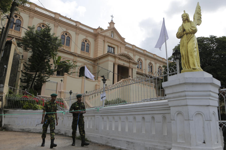 In this Sunday, May 12, 2019, photo, Sri Lankan soldiers stand guard at the Good Shepherd convent in Colombo, Sri Lanka. Catholic officials and parents in Sri Lanka are hopeful that church-run schools will begin to reopen soon for the first time since April’s devastating Easter Sunday attacks on churches and hotels. (AP Photo/Eranga Jayawardena)