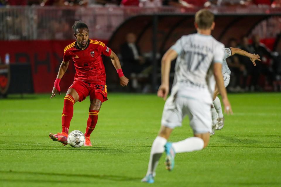 Phoenix Rising FC midfielder Kevon Lambert (27), left, looks for a pass during the first half against San Diego Loyal on Saturday, March 26, 2022, in Chandler.