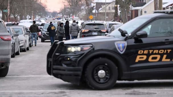 PHOTO: Detroit Police, Michigan State Police and ATF agents work the scene at West McNichols and Log Cabin in Detroit on the border of Highland Park, Mich., Feb. 2, 2023. (Detroit News via AP)