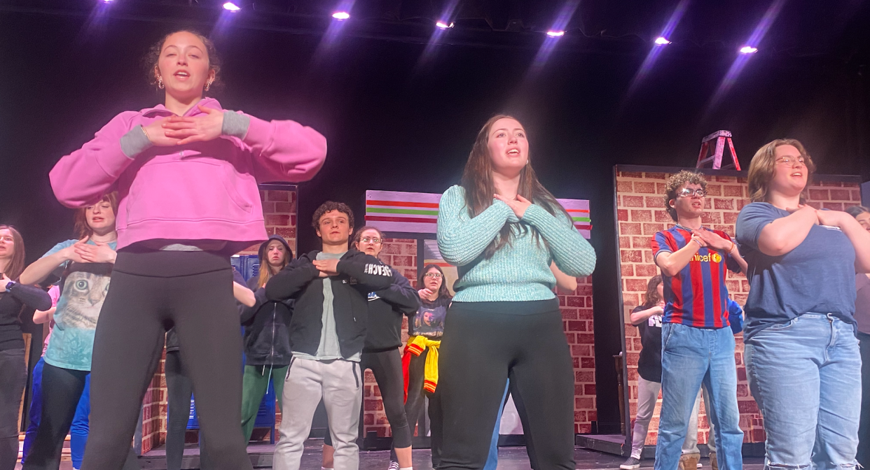 Carly Bradshaw, left, who plays Angie rehearses "The Prom" with fellow Fairhaven High School students.