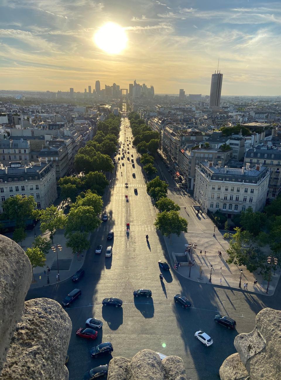 A view from the 1836 Arc de Triomphe at sunset in Paris.