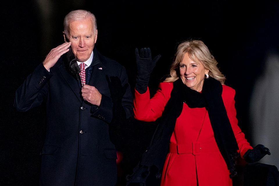 Joe and Jill Biden at the official White House Christmas tree lighting. - Credit: AP