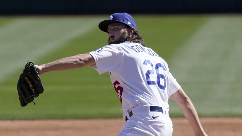 Los Angeles Dodgers pitcher Tony Gonsolin throws a pitch against the Colorado Rockies.