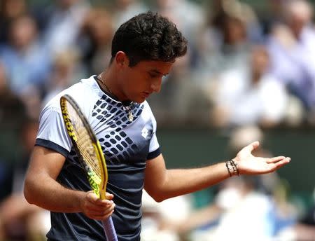 Nicolas Almagro of Spain reacts during the men's singles match against compatriot Rafael Nadal at the French Open tennis tournament at the Roland Garros stadium in Paris, France, May 28, 2015. REUTERS/Vincent Kessler