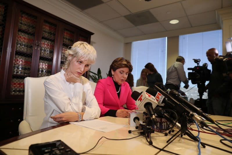 "Jane Doe 15," a 31-year-old unidentified woman, who accuses the late financier Jeffrey Epstein of sexually abusing her when she was a child, speaks at a news conference in Los Angeles