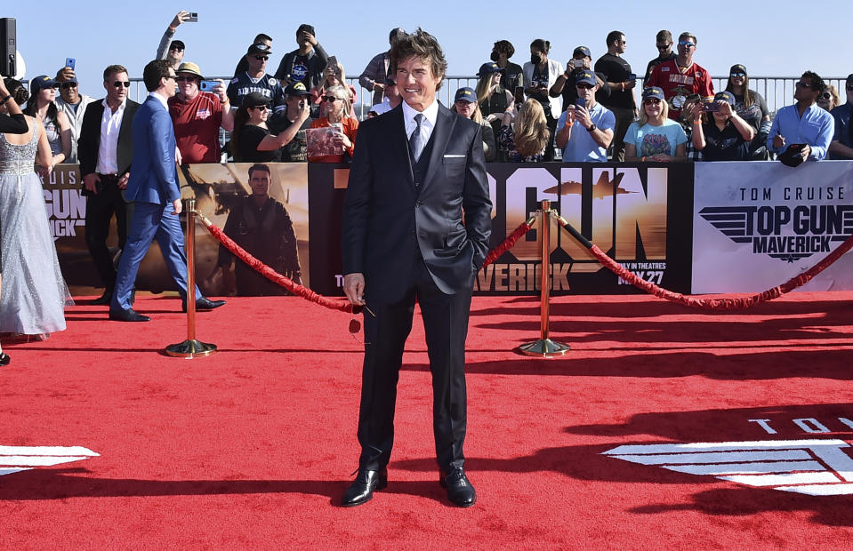 FILE - Tom Cruise arrives at the world premiere of "Top Gun: Maverick" on Wednesday, May 4, 2022, at the USS Midway in San Diego. The first “National Cinema Day” nationwide promotion appeared to work with the highest-attended day of 2022, drawing an estimated 8.1 million moviegoers on Saturday, Sept. 3, 2022, according to The Cinema Foundation. The top performing titles for the day included "Spider-Man: No Way Home," “Top Gun: Maverick,” “DC League of Super Pets” and “Bullet Train.” (Photo by Jordan Strauss/Invision/AP, File)