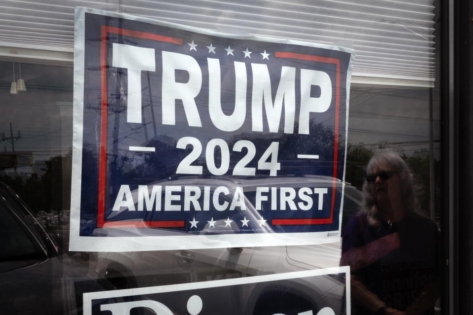 MIDDLETOWN, OHIO - JULY 23: A campaign sign hangs in the window of the Butler County Republican Party headquarters on July 23, 2024 in Middletown, Ohio. Middletown, which has a population of about 51,000, is where Republican vice presidential candidate Ohio Sen. J.D. Vance grew up and attended high school. (Photo by Scott Olson/Getty Images)