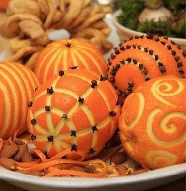 If you’ve got some time on your hands, crave pretty designs into oranges and clementines and place them in a bowl as your centrepiece. [Photo: Pinterest]