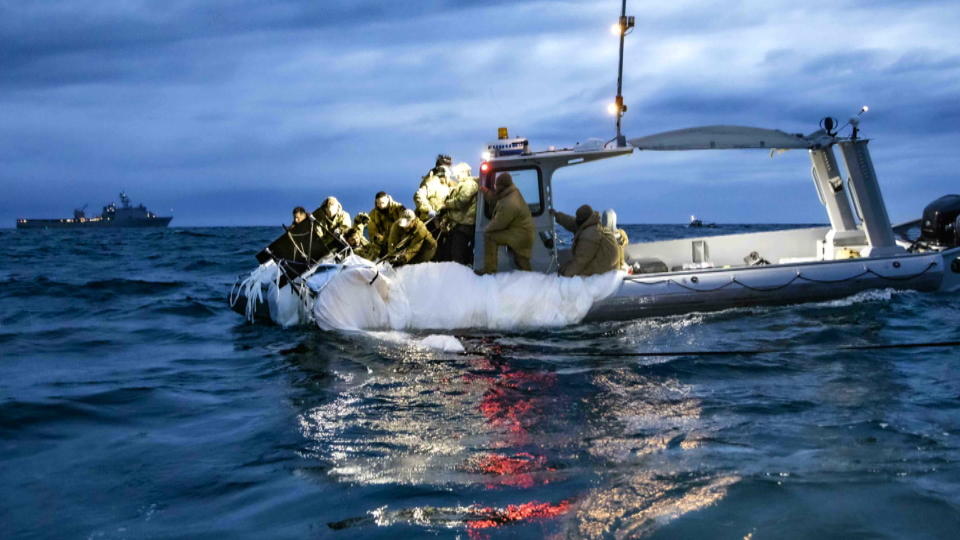 Wreckage from the Chinese balloon being collected from the Atlantic Ocean.  / Credit: Department of Defense