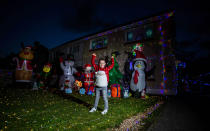 A mum has gone all out to cheer up her kids and neighbours by putting up her CHRISTMAS decorations three months early - including 3,000 outdoor lights. Caroline Gabe, 46, has been shielding with her children since March - and said putting up her tree and decorations in September was a much-needed boost. She has spent the year buying outdoor lights and installations - from as far away as America - and put them all up last week, on a whim. Almost all of them are outside - including 3,000 fairy lights, sparkling snow, an 8ft inflatable snowman, as well as Santa and his reindeer.