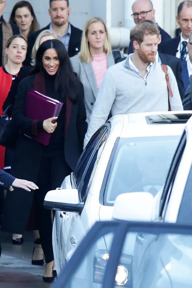 Meghan Markle and Prince Harry touch down in Sydney on Oct. 15.