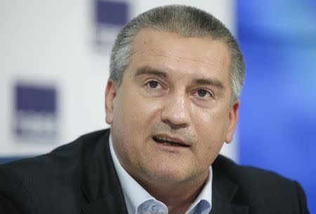 Pro-Russian head of Crimea Sergei Aksyonov speaks during a news conference in Moscow, October 16, 2014. REUTERS/Maxim Zmeyev