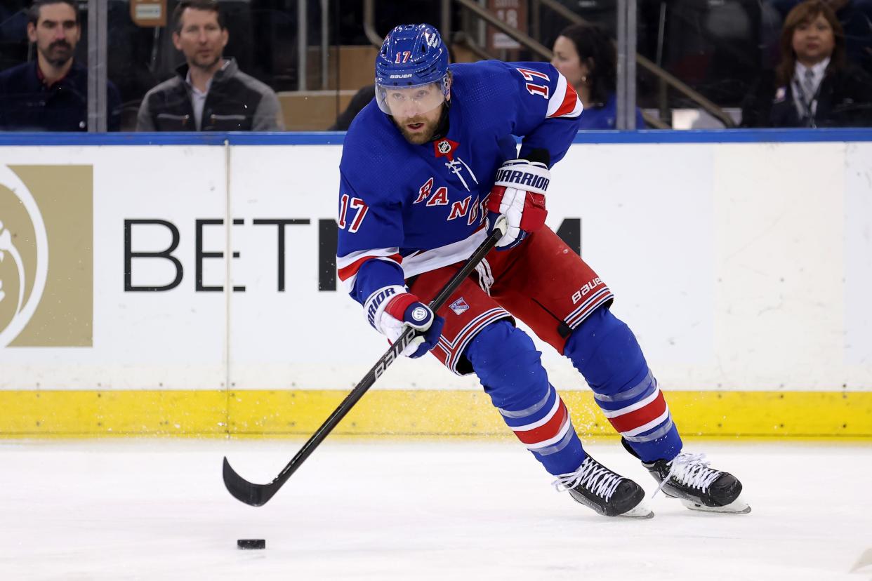 Feb 12, 2024; New York, New York, USA; New York Rangers right wing Blake Wheeler (17) skates with the puck against the Calgary Flames during the first period at Madison Square Garden.