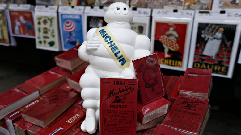 Michelin Man figurine with Michelin guides