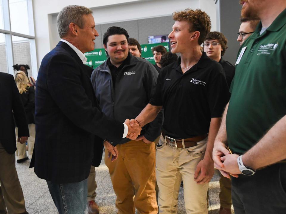 Gov. Bill Lee shakes hands with a Jackson State AMT student during his tour of Jackson State TCAT facilities in Jackson, Tenn., on Tuesday, Feb.6, 2024.