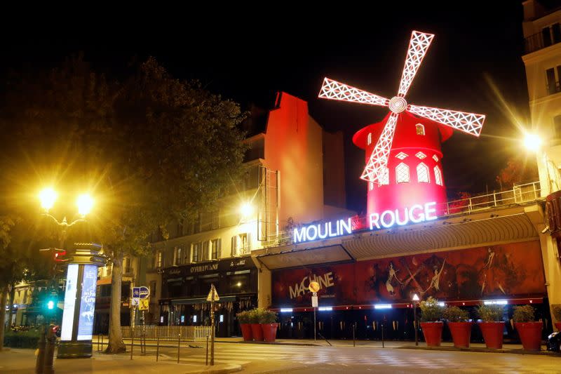 A view shows empty streets around the Moulin Rouge cabaret during the late-night curfew in Paris