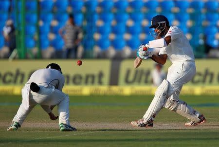 Cricket - India v New Zealand - first test cricket match - Green Park Stadium, Kanpur, India - 24/09/2016. India's Cheteshwar Pujara plays a shot. REUTERS/Danish Siddiqui