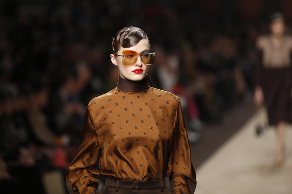 A model wears a creation as part of the Fendi women's Fall-Winter 2019-2020 collection, that was presented in Milan, Italy, Thursday, Feb.21, 2019. (AP Photo/Antonio Calanni)